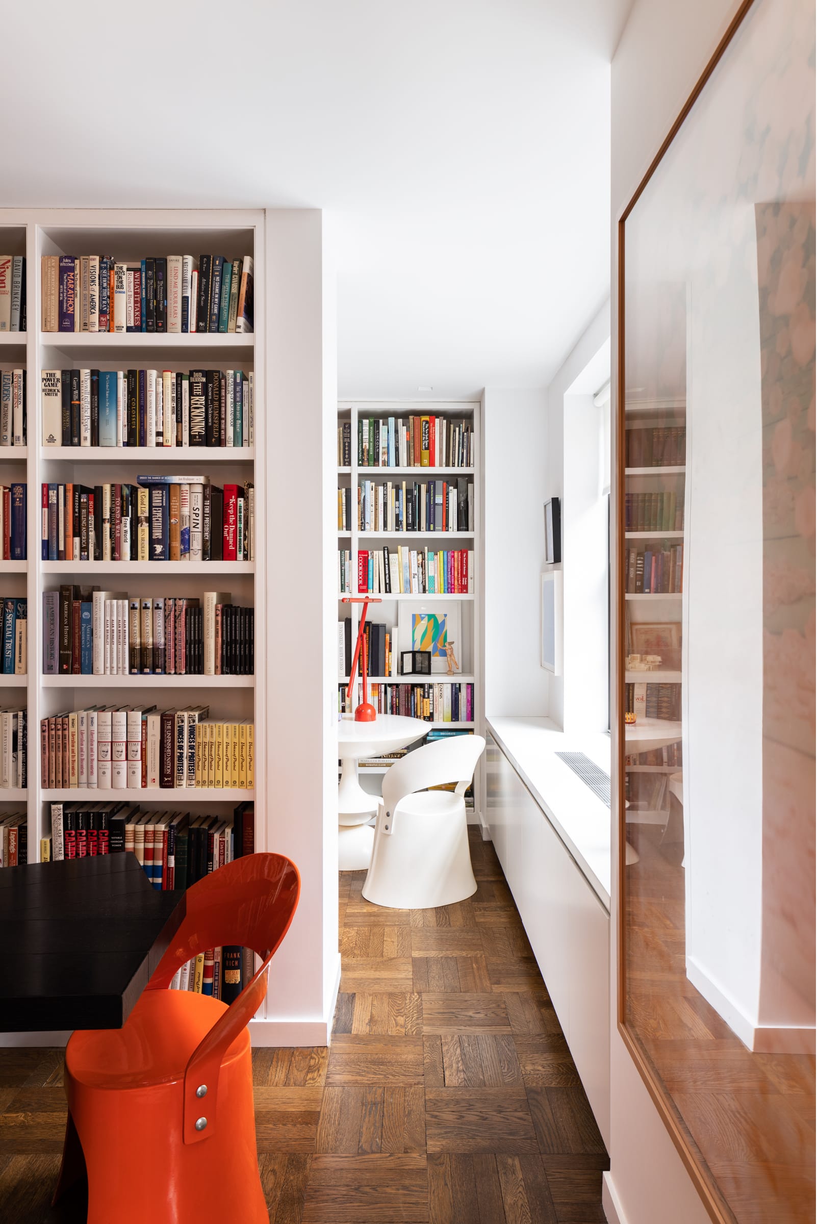 living room with with built in bookcases
