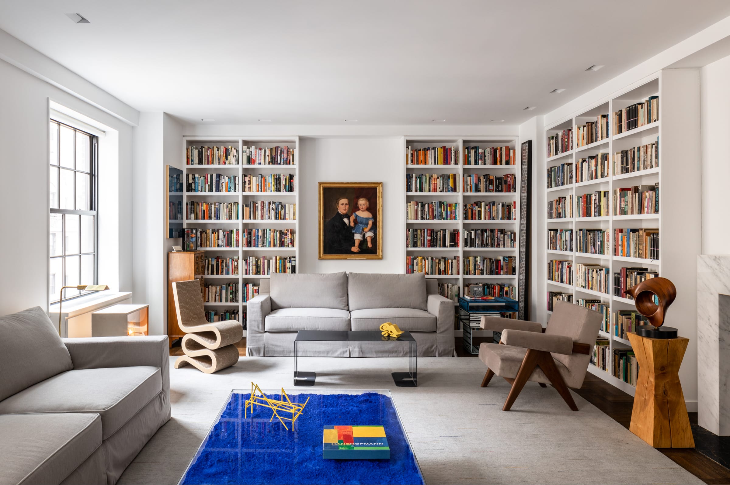 living room with with built in bookcases