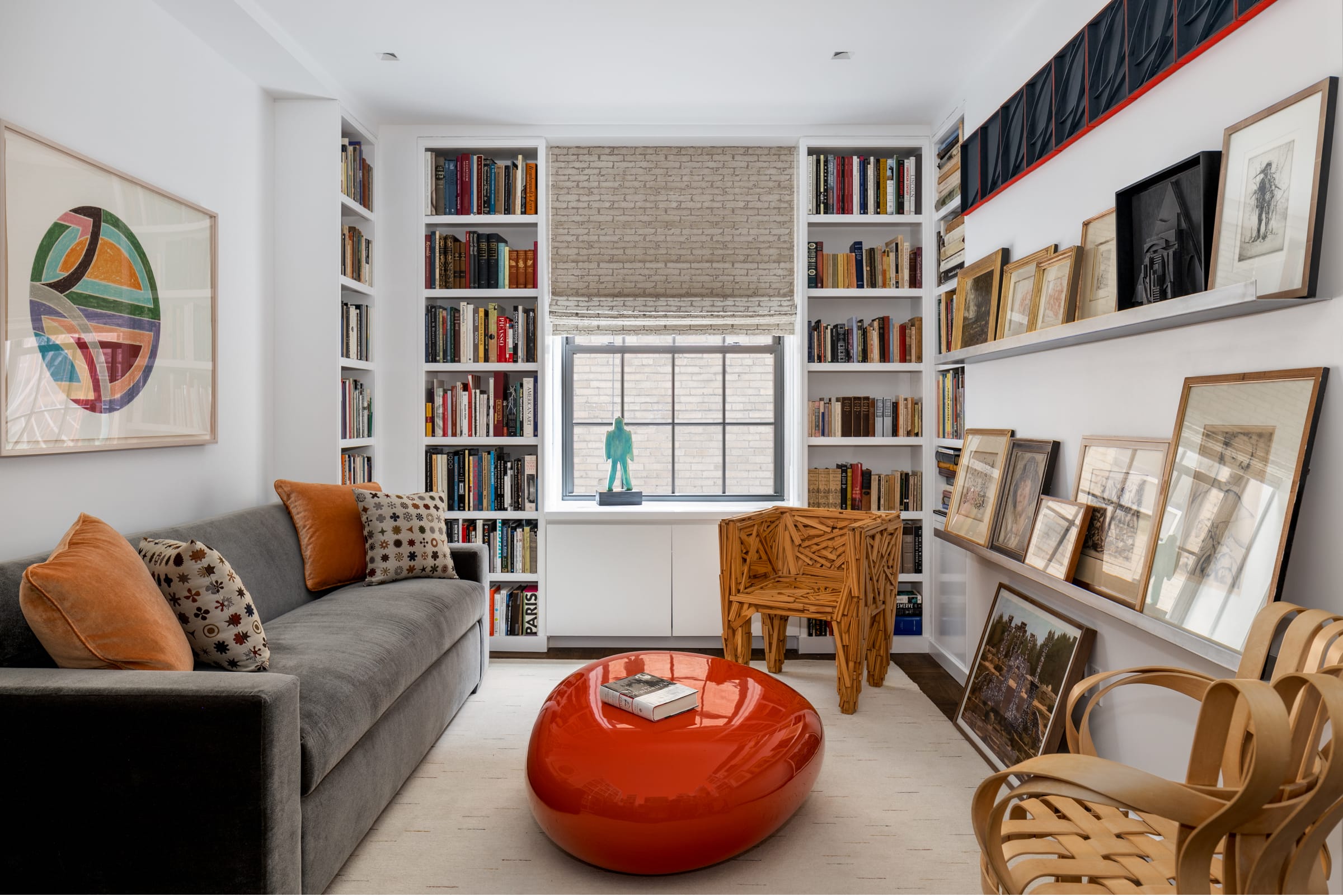 Bedroom with built in bookcases
