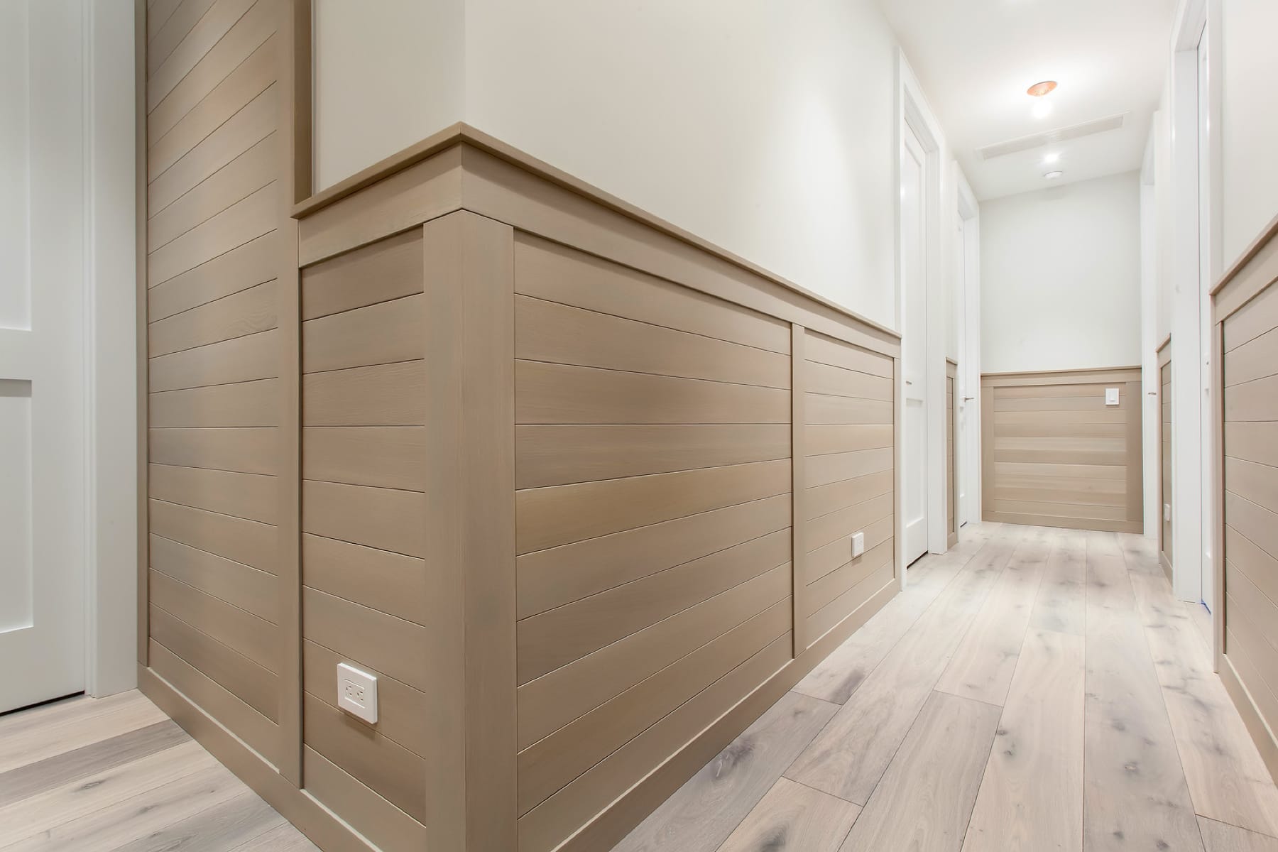 hallway with wainscot