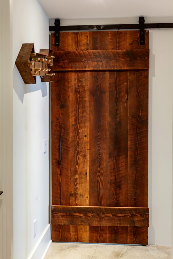 living room with a reclaimed wood ceiling